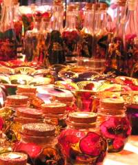 A colourful stall of bottled produce at The Rocks Market Sydney