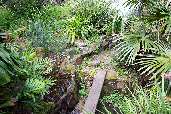 A rocky path has been created that connects the huts at Crater Cove, Sydney