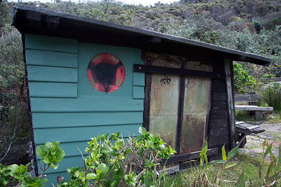 Rustic small wooden hut at Crater Cove, Sydney