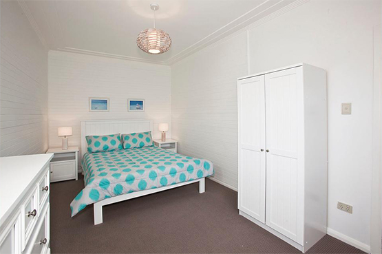 Main bedroom in Oliver Street rental property, Sydney